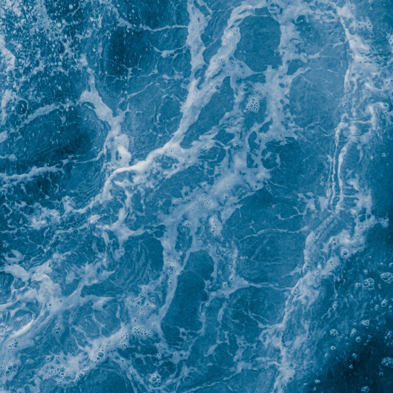 Dark blue sea surface with waves