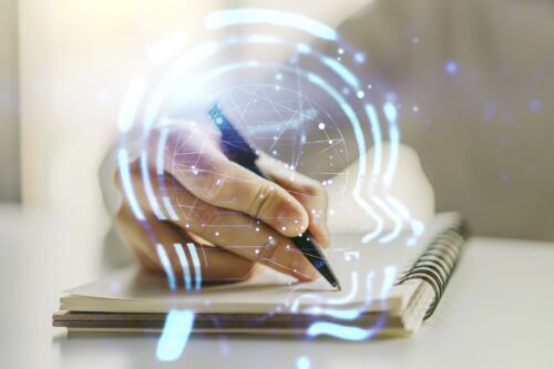 Handwriting and the Brain Connection Creative artificial Intelligence concept with human head sketch and man hand writing in diary on background. Double exposure